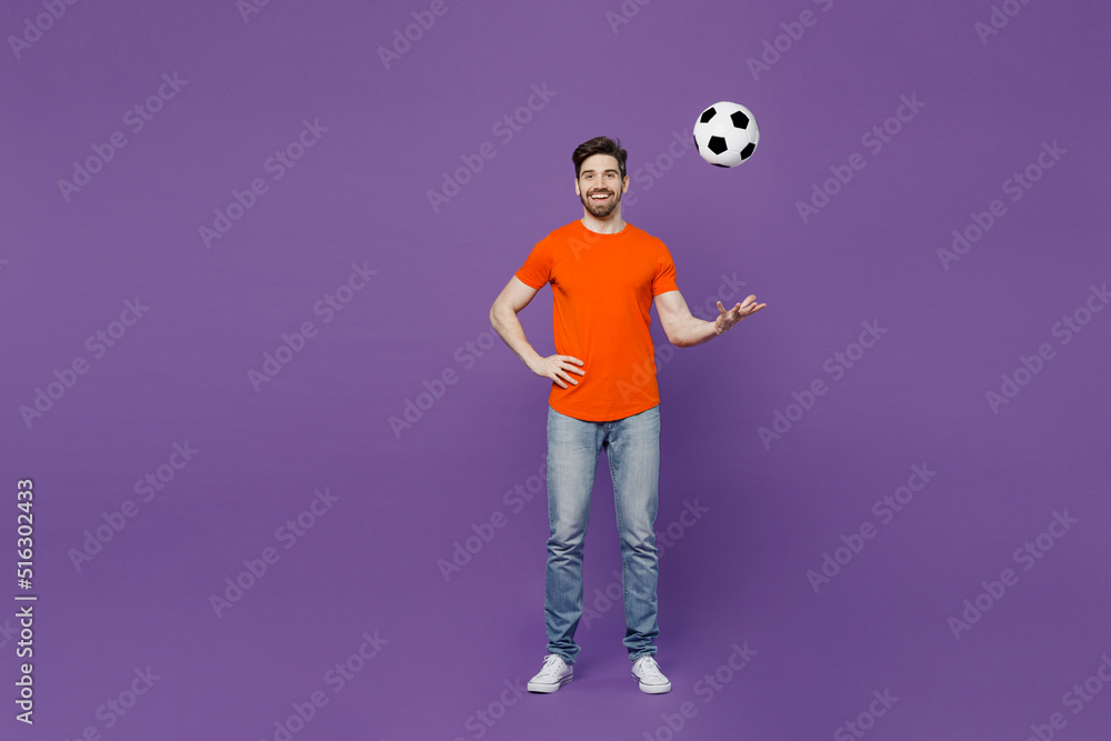 Full body young smiling cheerful fan man he 20s wear orange tshirt cheer up support football