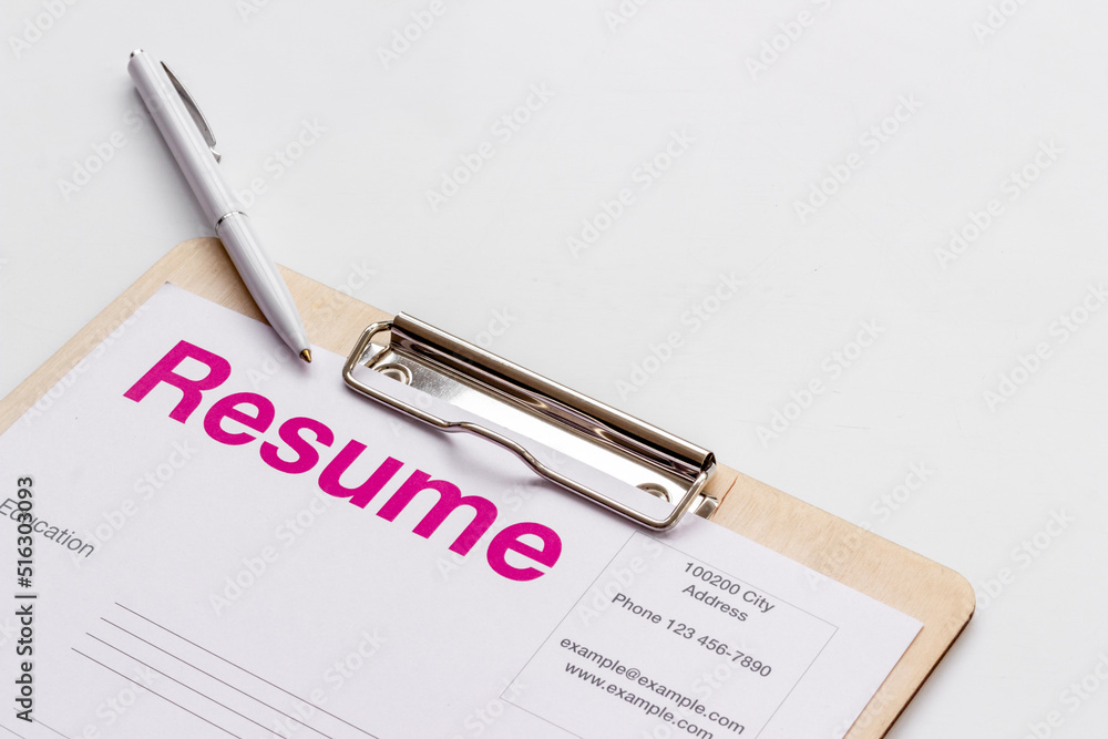 Close up of resume application on HR manager office table Close up of resume application on HR manager office table