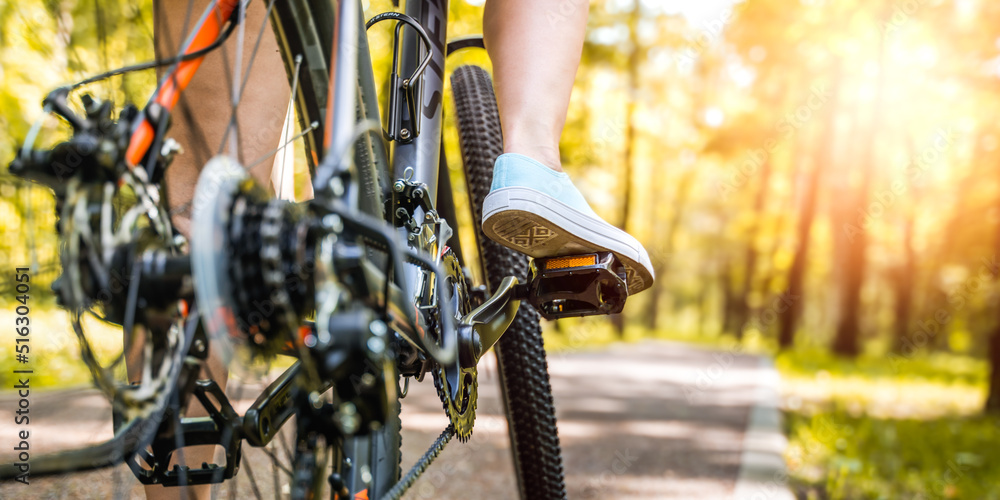 Close up shot of female cyclist. Yellow and orange color tones. Close up shot of female cyclist. Yellow and orange color tones.