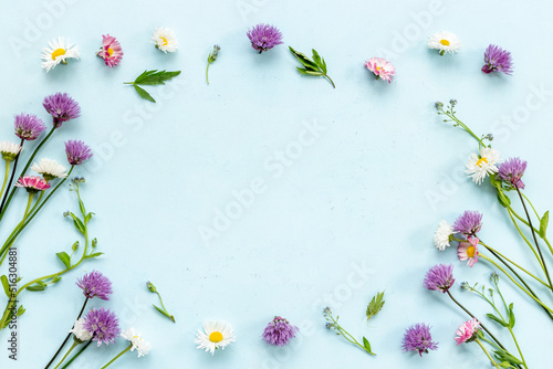 Wild meadow flowers chamomile cornflower and ranunculus. Summer floral pattern