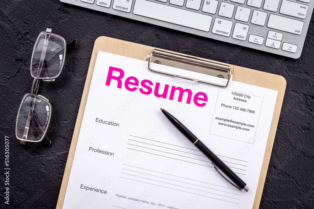 Searhing for a new job. Resume application form on office table Searhing for a new job. Resume application form on office table