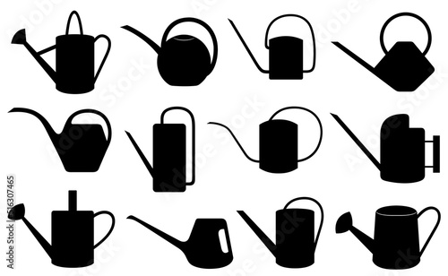 Set of different watering cans isolated on white
