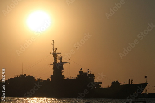 Sunset and silhouette ship