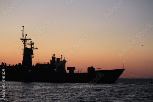 sunset and army ship