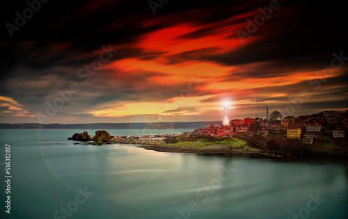 Famous Rumeli Lighthouse and the Bosporus in Istanbul photo