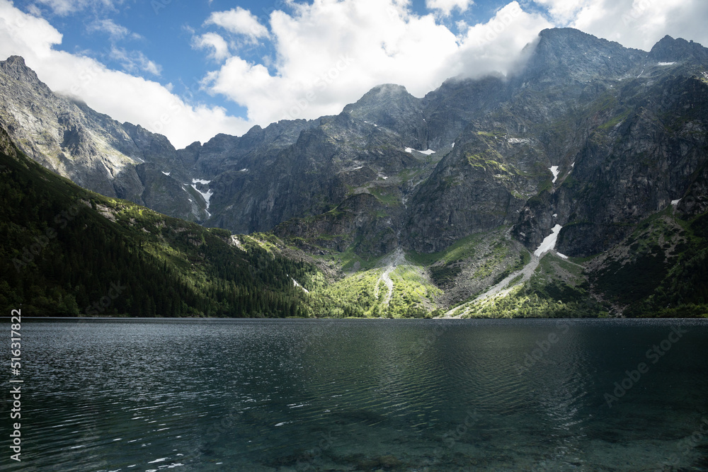 View of the alpine lake Morskie Oko and mountains in the Polish Tatras.