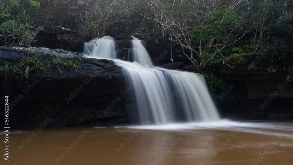 Fototapeta premium Irrawong Falls after a week of rain, Sydney, Australia.