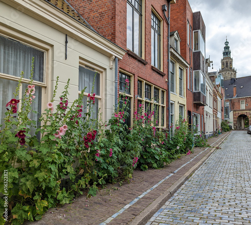 typical row of houses in Groningen Netherlands in the background the Martinskirche © RSK Foto Schulz
