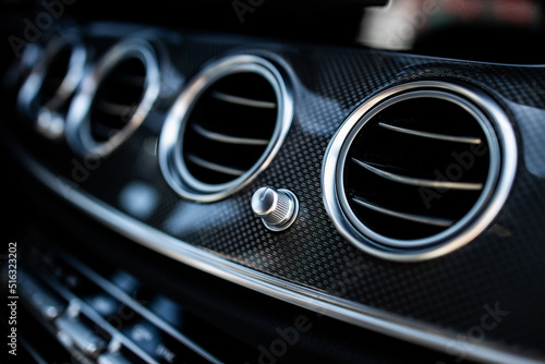 front panel in a luxury car with ventilation and climate control © AvokadoStudio