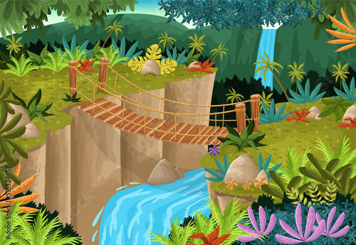 Rope bridge in green forest with waterfall. Nature landscape.
