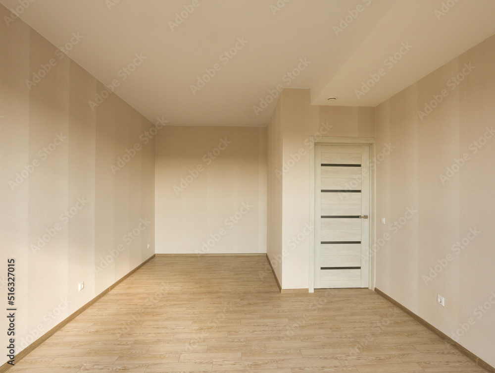 An empty bedroom with a budget clean renovation in a new apartment An empty bedroom with a budget clean renovation in a new apartment