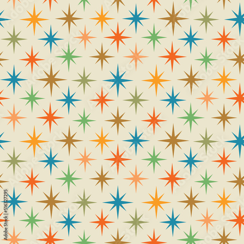 Mid century modern colorful atomic starburst in blue, green, yellow, orange and coral. For wallpaper, home décor, fabric and textile 