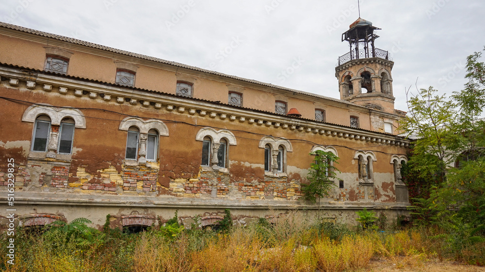 Historic building with a tower.  Medical Mud Sanatorium Kuyalnik