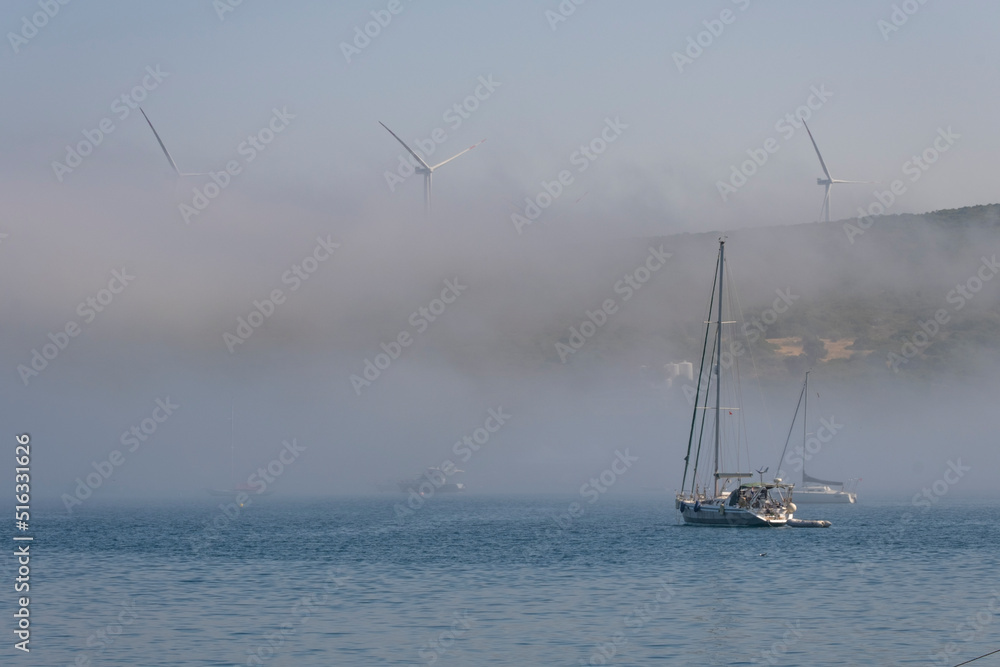 Wind Turbines in The Fog
