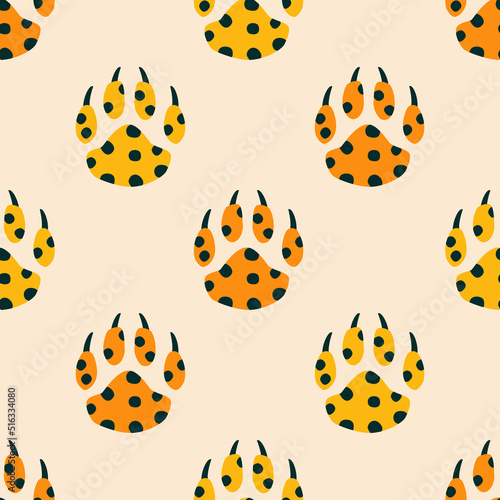 Paws of African leopards hand drawn vector illustration. Colorful safari animal seamless pattern for kids fabric or wallpaper.