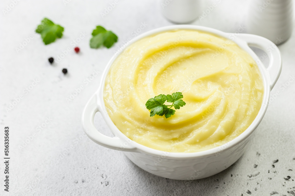 Garlic white bean mash in a bowl. Top view, copy space, flat lay. Garlic white bean mash in a bowl. Top view, copy space, flat lay.