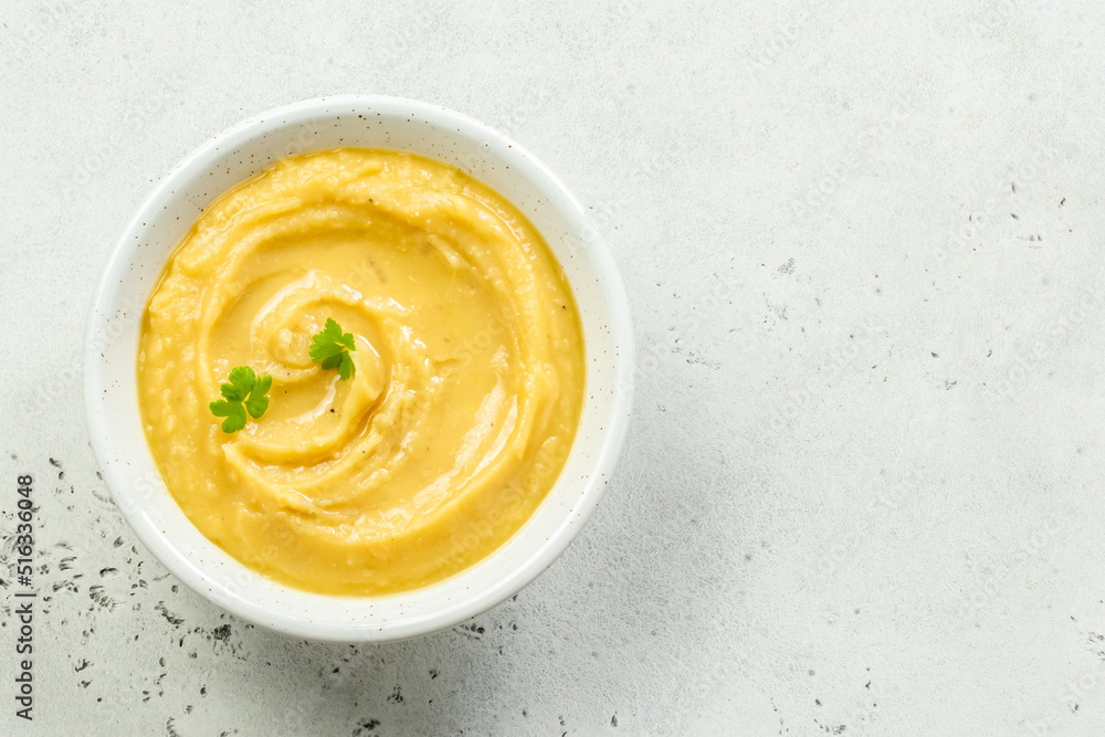 Healthy vegan split pea mash with herbs and olive oil. Top view, copy space, flat lay. Healthy vegan split pea mash with herbs and olive oil. Top view, copy space, flat lay.