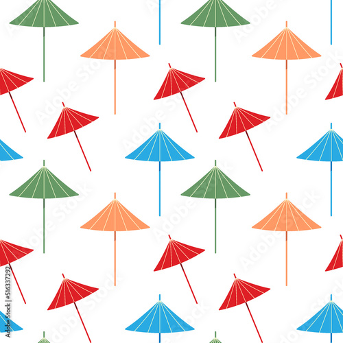 Bright summer pattern with an abstract image of colorful cocktail umbrellas in trendy hues.