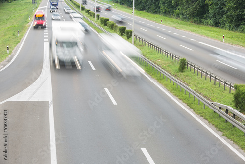 Wallpaper Mural Motion blur of camper and cars  passing on a highway in summer. Car travels on the highway Torontodigital.ca