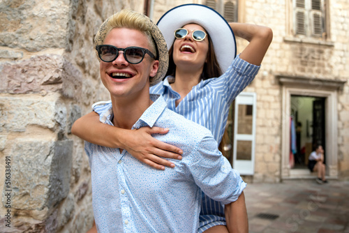 Romantic tourist couple in love enjoying summer vacation. People travel fun concept