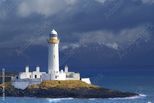 Scenic view of Lismore lighthouse on the coast of the Isle of Mull, Scotland photo