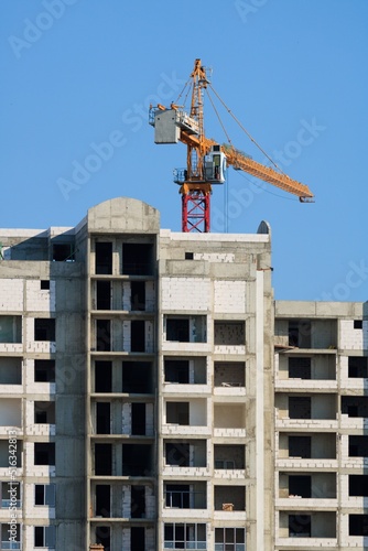 The architectural complex of residential buildings on sky background