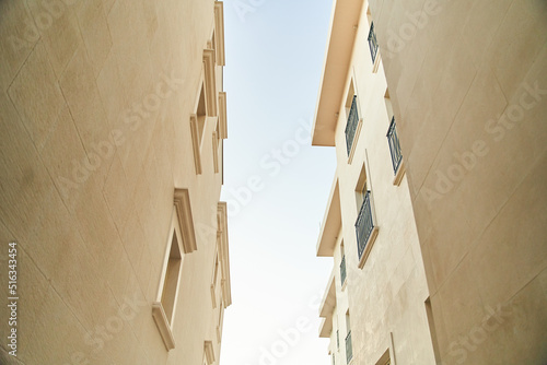 Blue sky and tops of bright houses in Tivat, Montenegro. High quality photo
