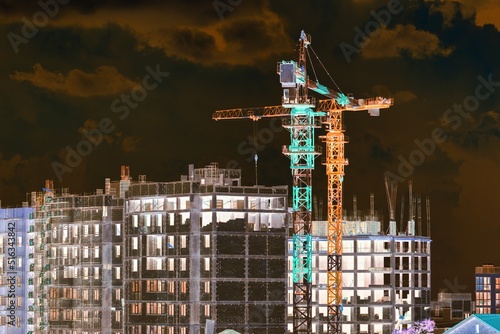 The architectural complex of residential buildings on sky background