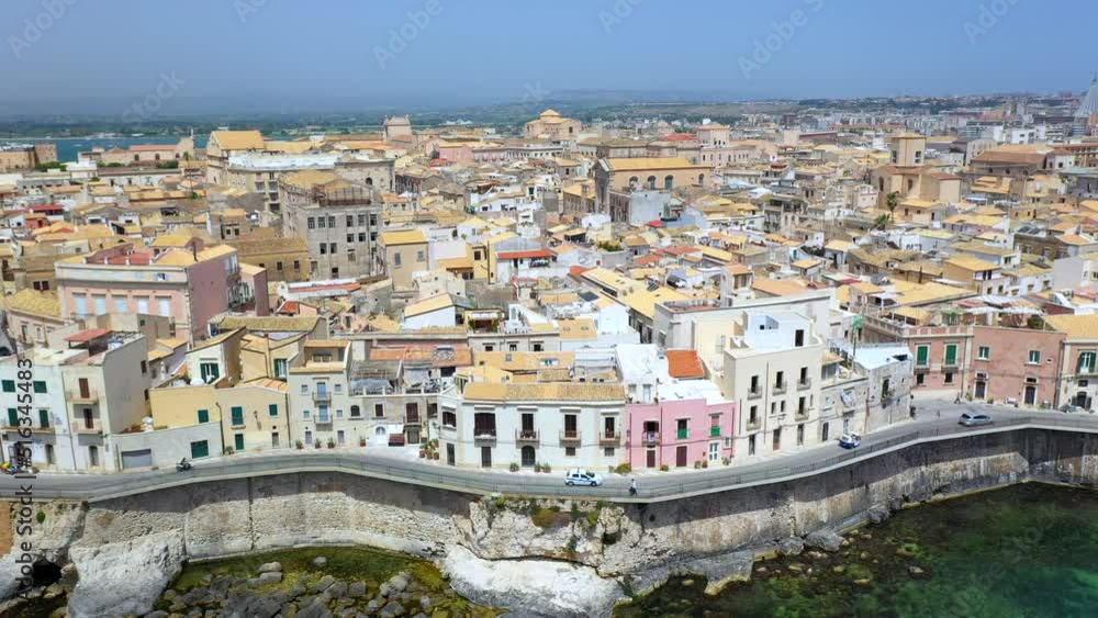 Cinematic drone shot of Syracuse coastline, historic city on the Italian island of Sicily Cinematic drone shot of Syracuse coastline, historic city on the Italian island of Sicily