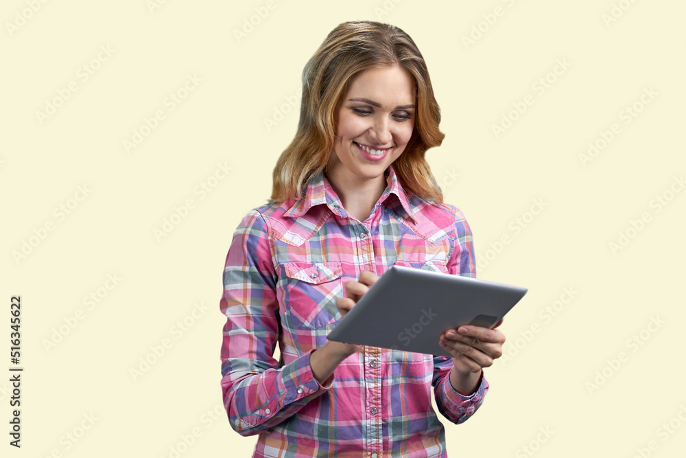 Young smiling woman holding digital tablet pc. Isolated on white background. People and technology concept. Young smiling woman holding digital tablet pc. Isolated on white background. People and technology concept.