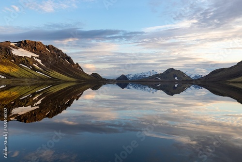 Panoramic mirroring view of the lake Alftavatn on the Laugavegur trail in Iceland photo