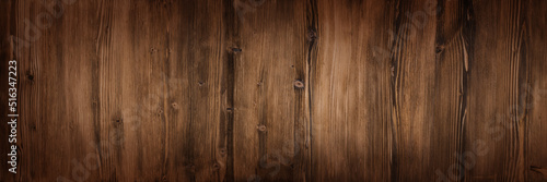 Dark wood texture background. Horizontal wooden surface with nature pattern. Top view of a vintage wooden plank. Brown matte rustic wood for a background photo