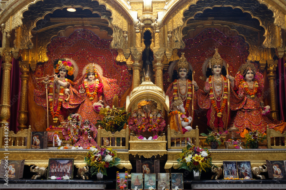 Bhaktivedanta Manor temple gods.left to right: Krishna, Rada, Rama, Sita, Laxmi.Hanuman in front of Rama