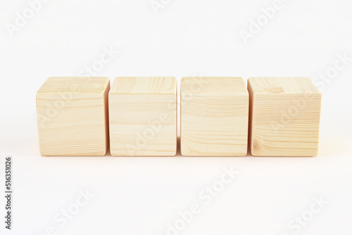 four wooden cube block in row isolated on white background, blank sample template for design. 3d render
