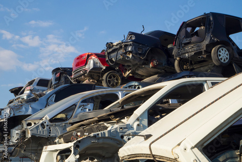 Auto graveyard - cars waiting to be recycle in junk yard in Turkey, Ankara - stacked cars in car cemetery 