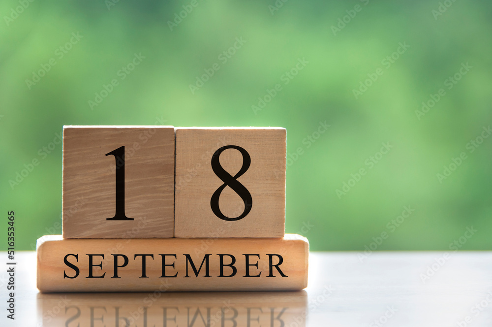 September 18 calendar date text on wooden blocks with copy space for ideas. Copy space and calendar concept September 18 calendar date text on wooden blocks with copy space for ideas. Copy space and calendar concept
