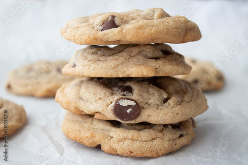 Photography A stack of four chocolate chip cookies