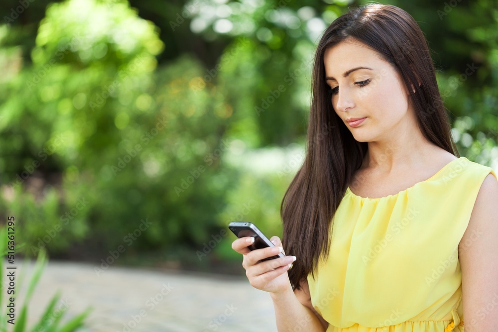 Portrait of a Woman Using Smartphone