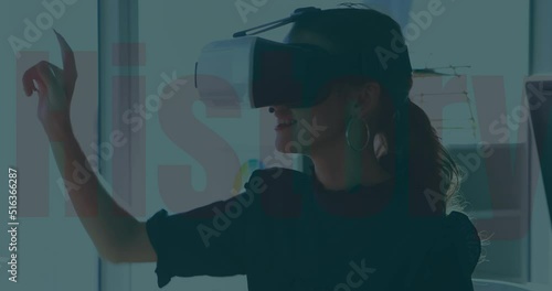 Animation of digital icons over caucasian woman using vr headset photo
