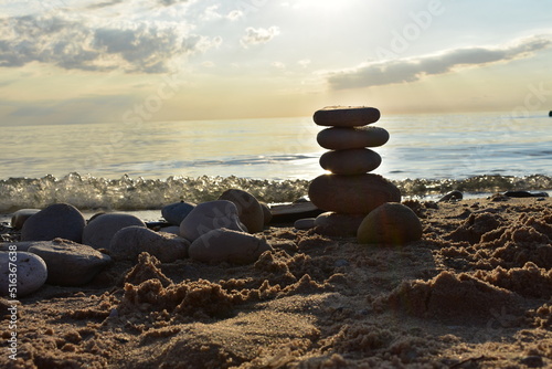 Photography Stacked Stones During Sunset