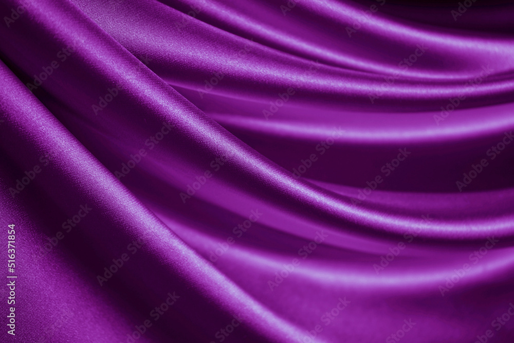 Bright purple silk satin. Soft wavy folds. Shiny silky fabric. Fuchsia color elegant background with space for design. Curtain. Drapery. Christmas, valentine, anniversary, party, celebration concept. Bright purple silk satin. Soft wavy folds. Shiny silky fabric. Fuchsia color elegant background with space for design. Curtain. Drapery. Christmas, valentine, anniversary, party, celebration concept.
