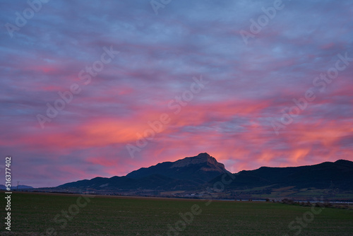 Beautiful sunset on the Aragon river valley with a view of Peña Oroel, the iconic mountain near Jaca