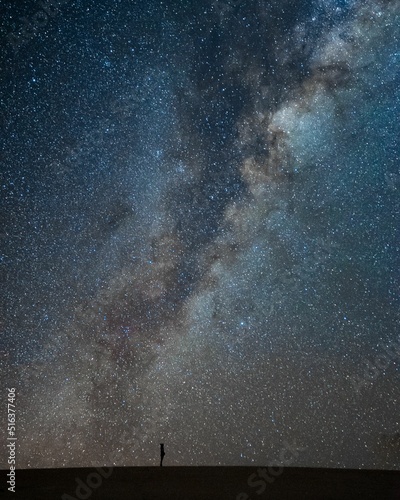 Cuadro en lienzo Beautiful shot of a man enjoying a milky way sky