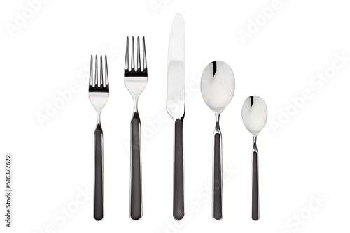 Set of fork, knife and spoon isolated on white background. Cutlery is on the table