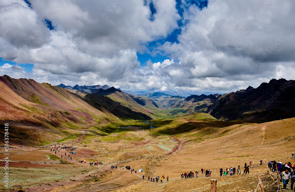 Mountain landscape. Tourists on the route to the mountain.