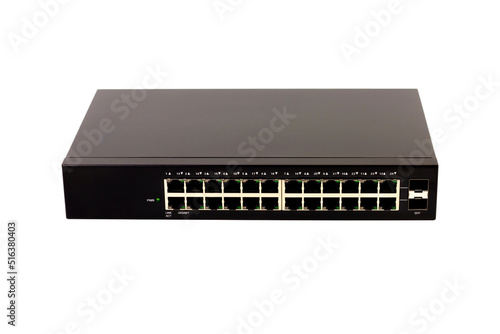 24-port gigabit switch black color isolated on white background. Components to create local area network for share data and device. photo