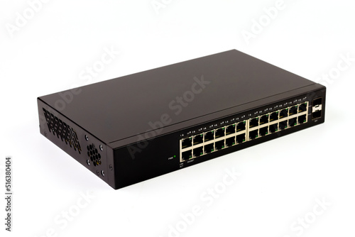 24-port gigabit switch black color isolated on white background. Components to create local area network for share data and device.