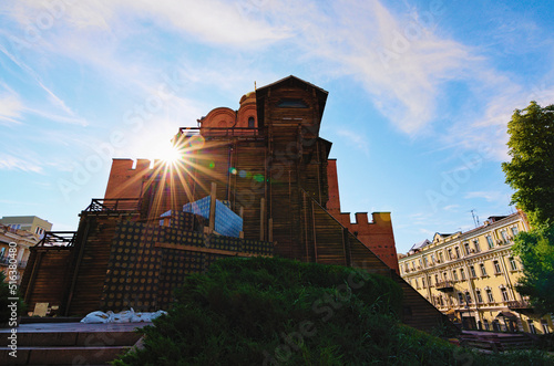 Wide-angle landscape view of ancient Golden Gate. Statue of Yaroslav the Wise protected against russian shelling. russian military aggression against Ukraine photo