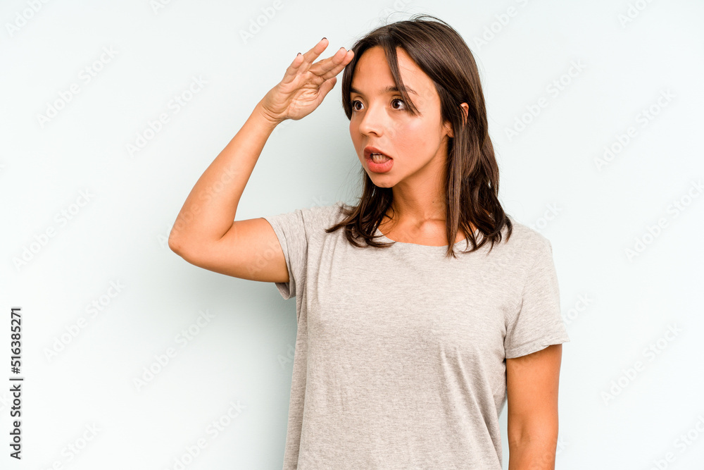 Young hispanic woman isolated on blue background sad, serious face, feeling miserable and displeased. Young hispanic woman isolated on blue background sad, serious face, feeling miserable and displeased.