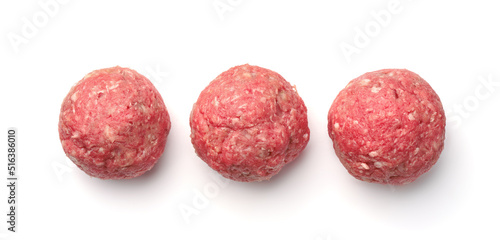 Top view of  three fresh raw homemade meatballs photo